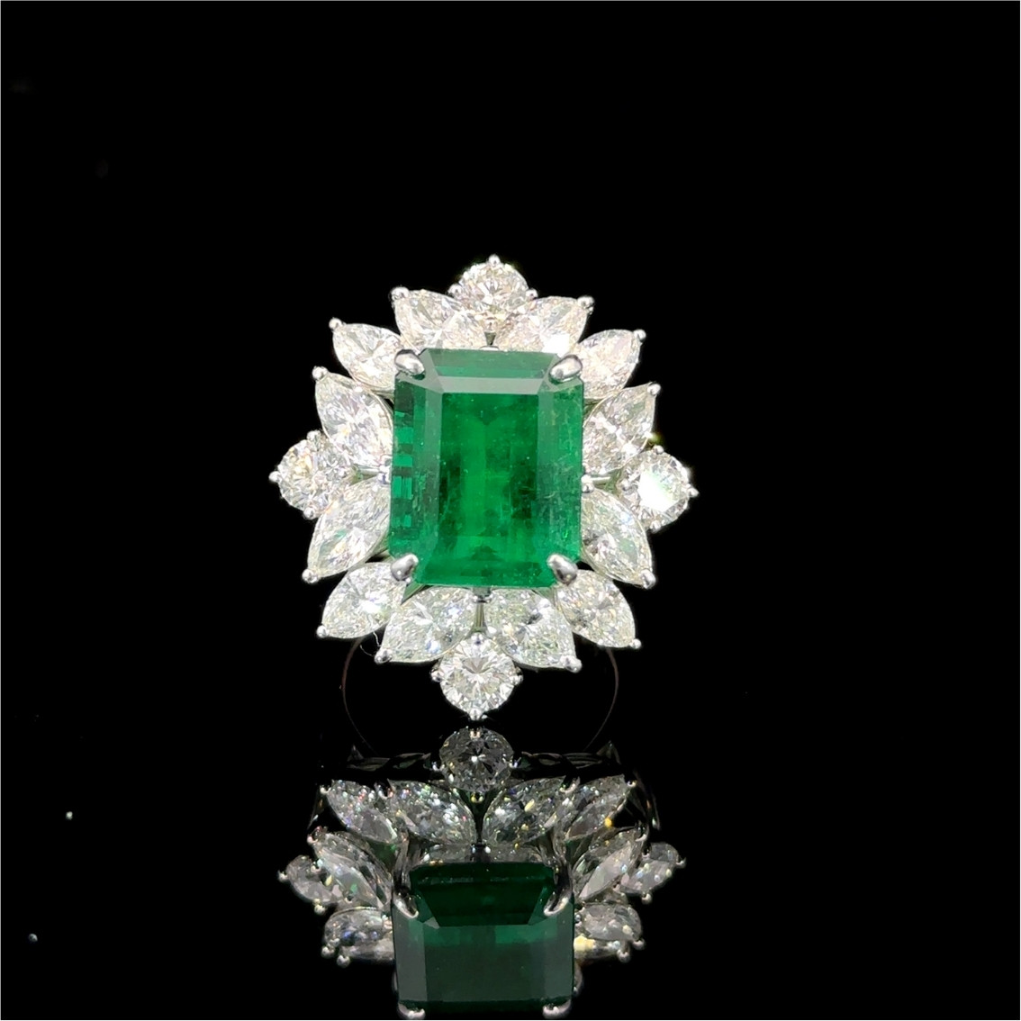 Emerald and diamond cluster ring