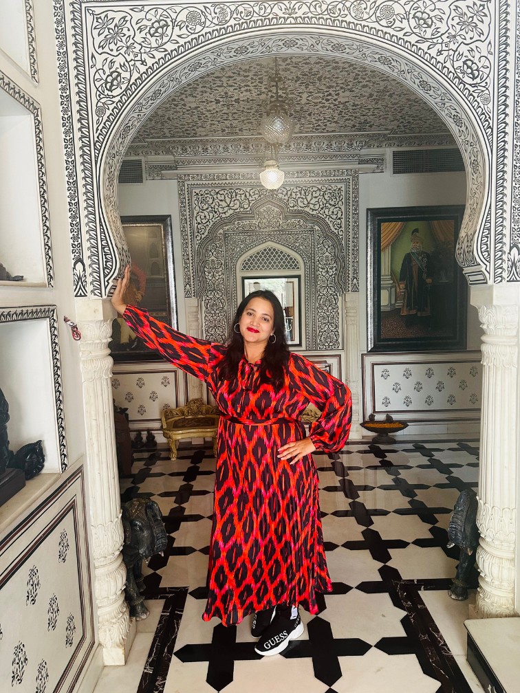 Meghna Patel in black and white archway at Jaipur