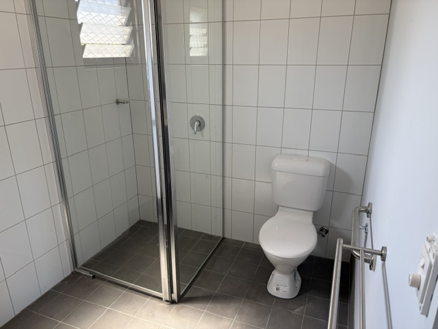 Bathroom vanity and mirror inside Darwin-built transportable accommodation