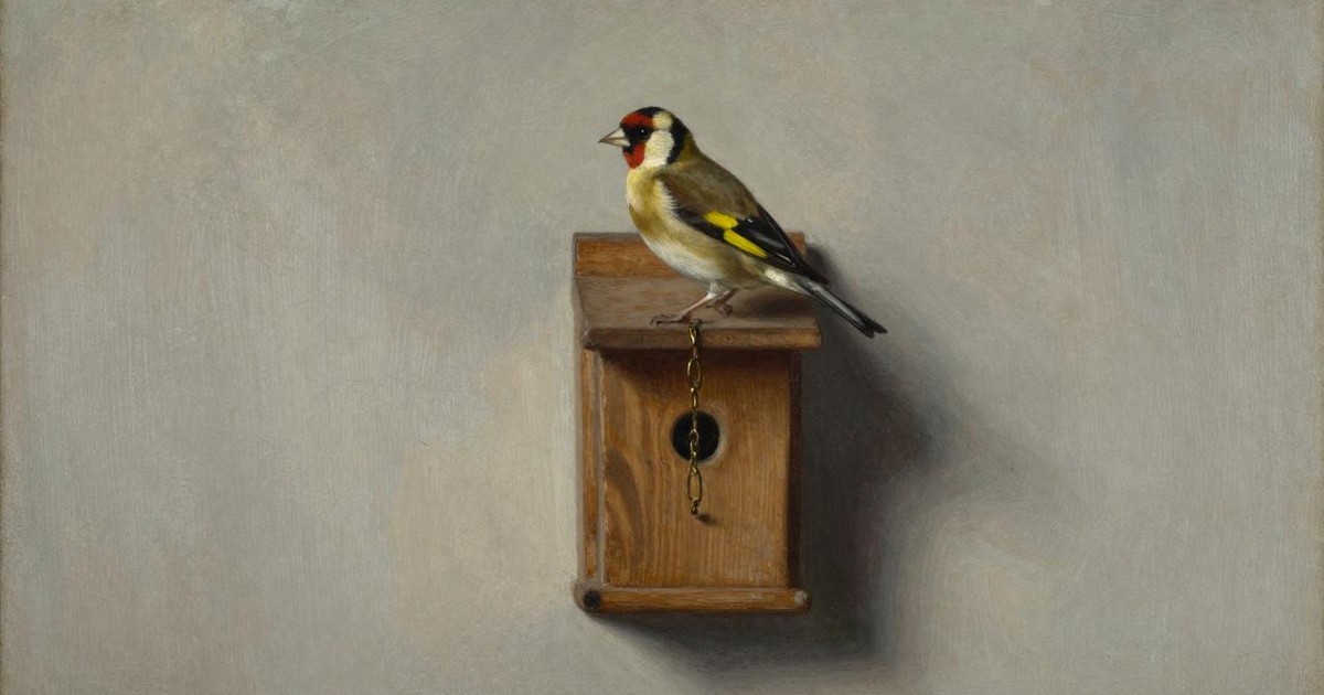 Oil painting of a goldfinch perched on a small wooden box fixed to a pale plaster wall