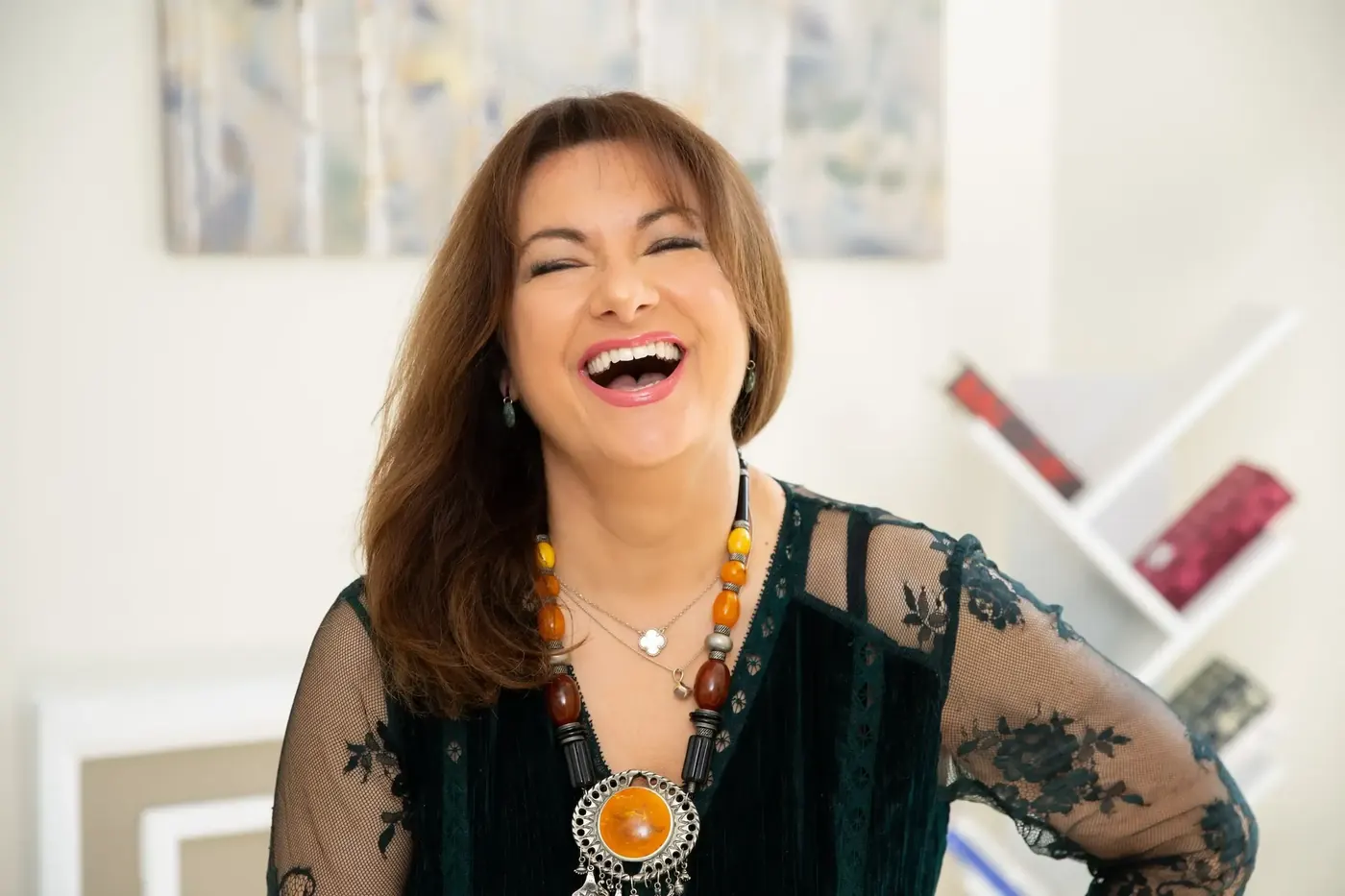 Artemis Manias, Chartered Counselling Psychologist, smiling warmly