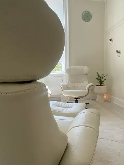 Cream armchair in the Central London therapy room