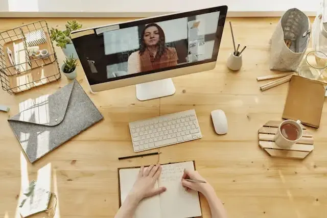 Online therapy session via Zoom on a desktop computer