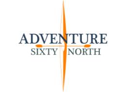 Desk with leather desk pad, walnut desk organizer, wireless keyboard and mouse, and porcelain mug.