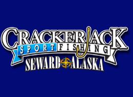 Desk with leather desk pad, walnut desk organizer, wireless keyboard and mouse, and porcelain mug.