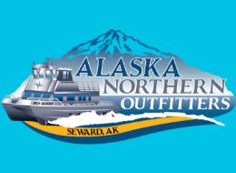 Wood table with porcelain mug, leather journal, brass pen, leather key ring, and a houseplant.