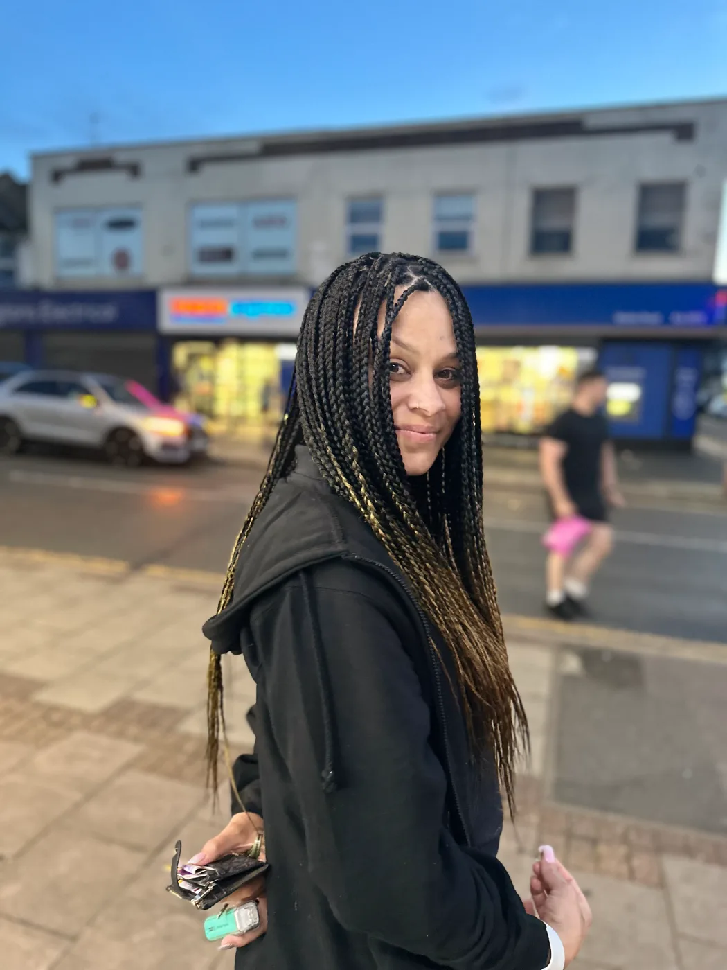 Knotless braids on a London street