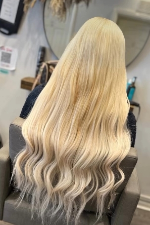 Long blonde waves hair extensions by Fly Girls Ipswich
