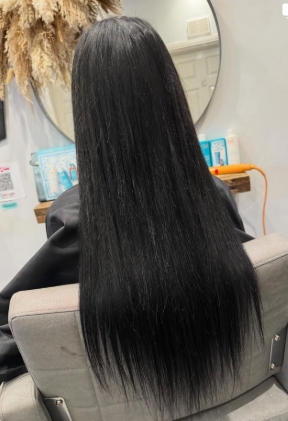 Long black straight hair extensions by Fly Girls Ipswich
