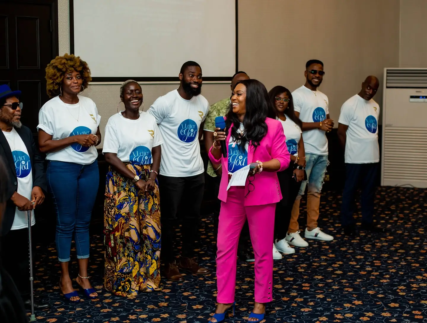 Julia Apea walking and speaking