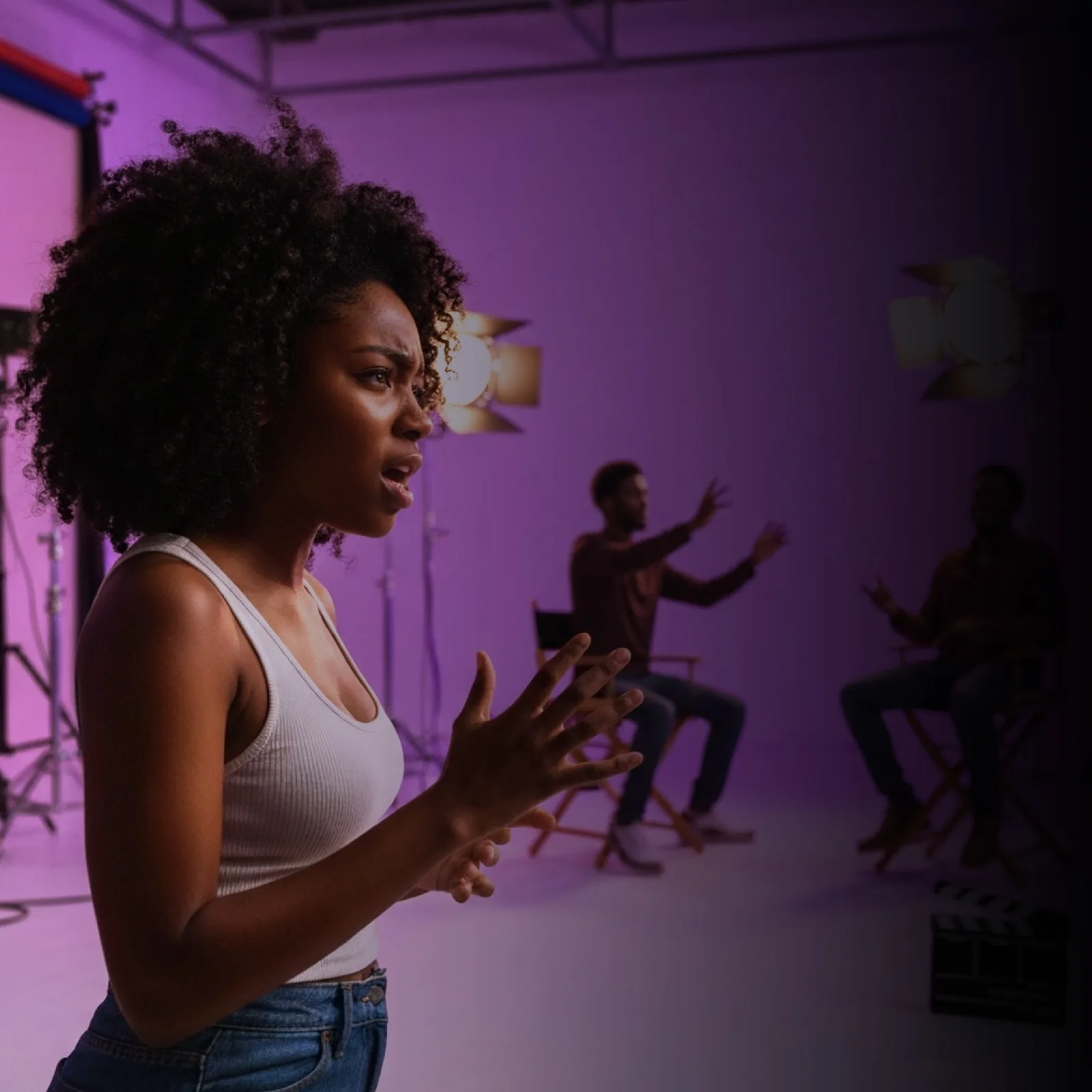 Acting students rehearsing a scene on set at Revele Creative Academy, Accra