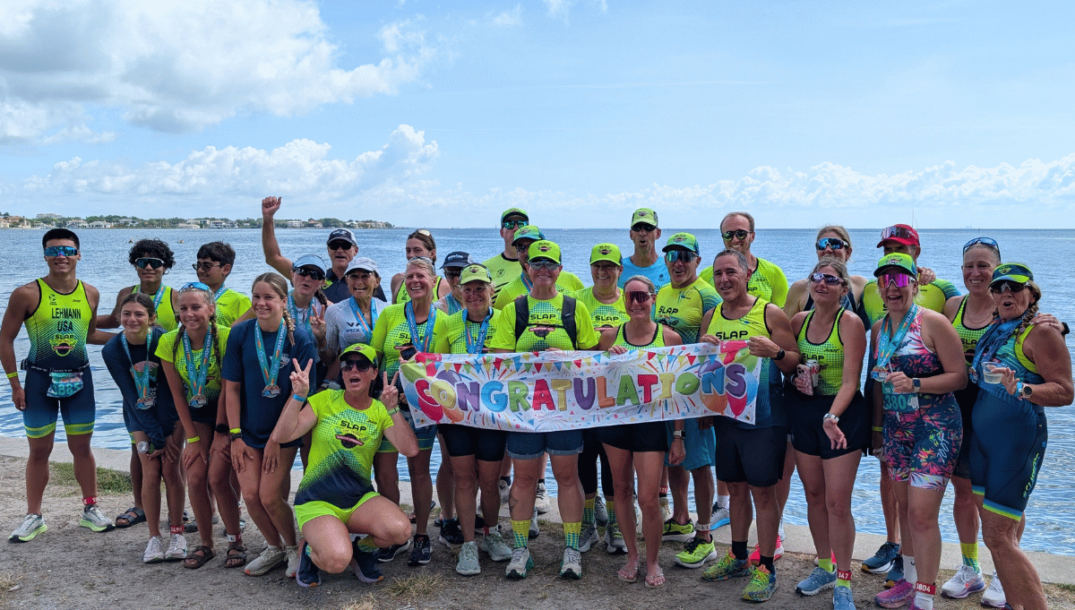SLAP Tri Team celebrating at a triathlon