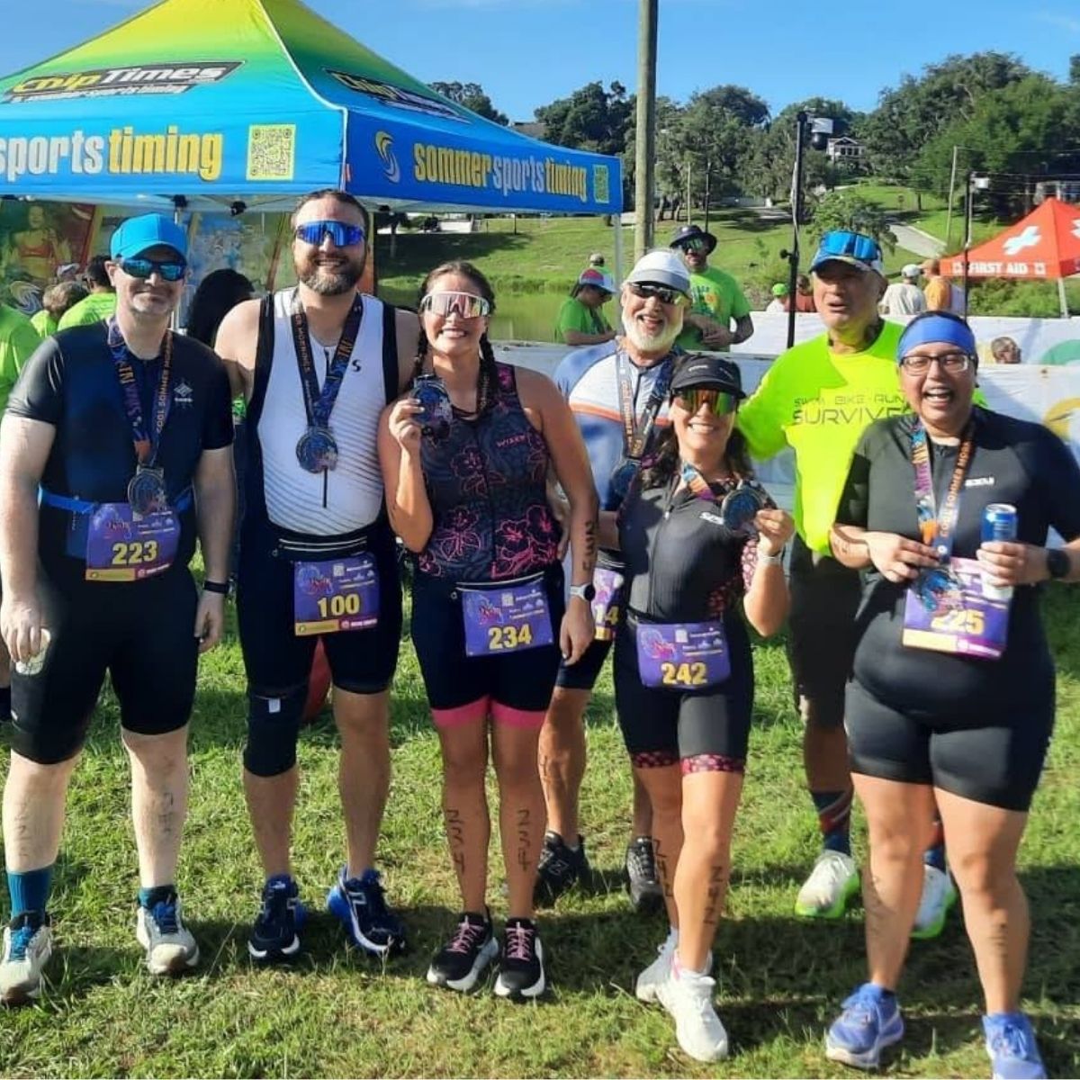 Try-a-Tri finishers with Coach Don celebrating
