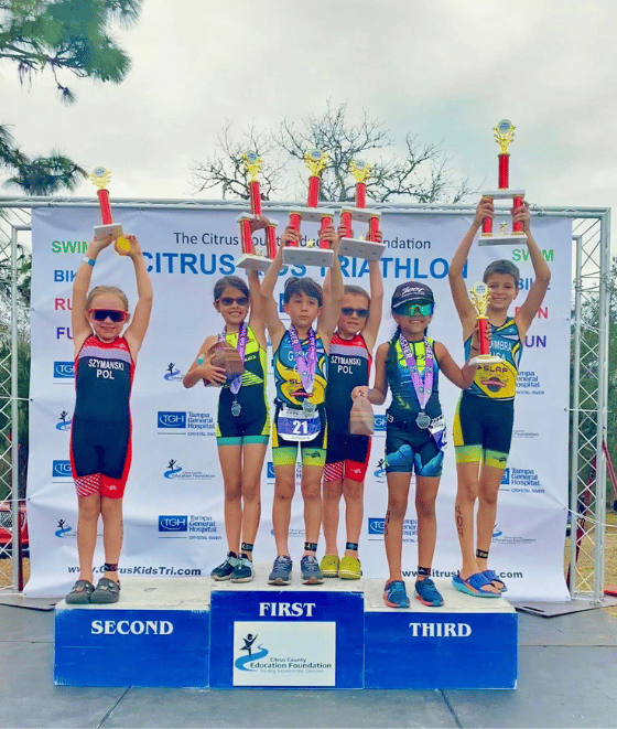 Youth triathlon team on the awards podium