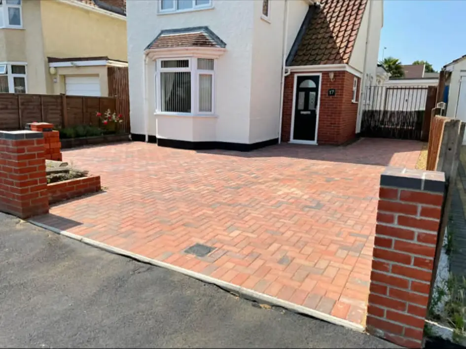 Modern block paved driveway in bright daylight in Norfolk.
