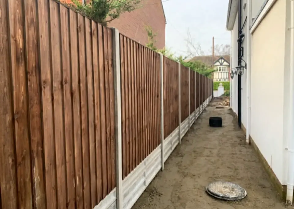 Fence with matching garden gate.