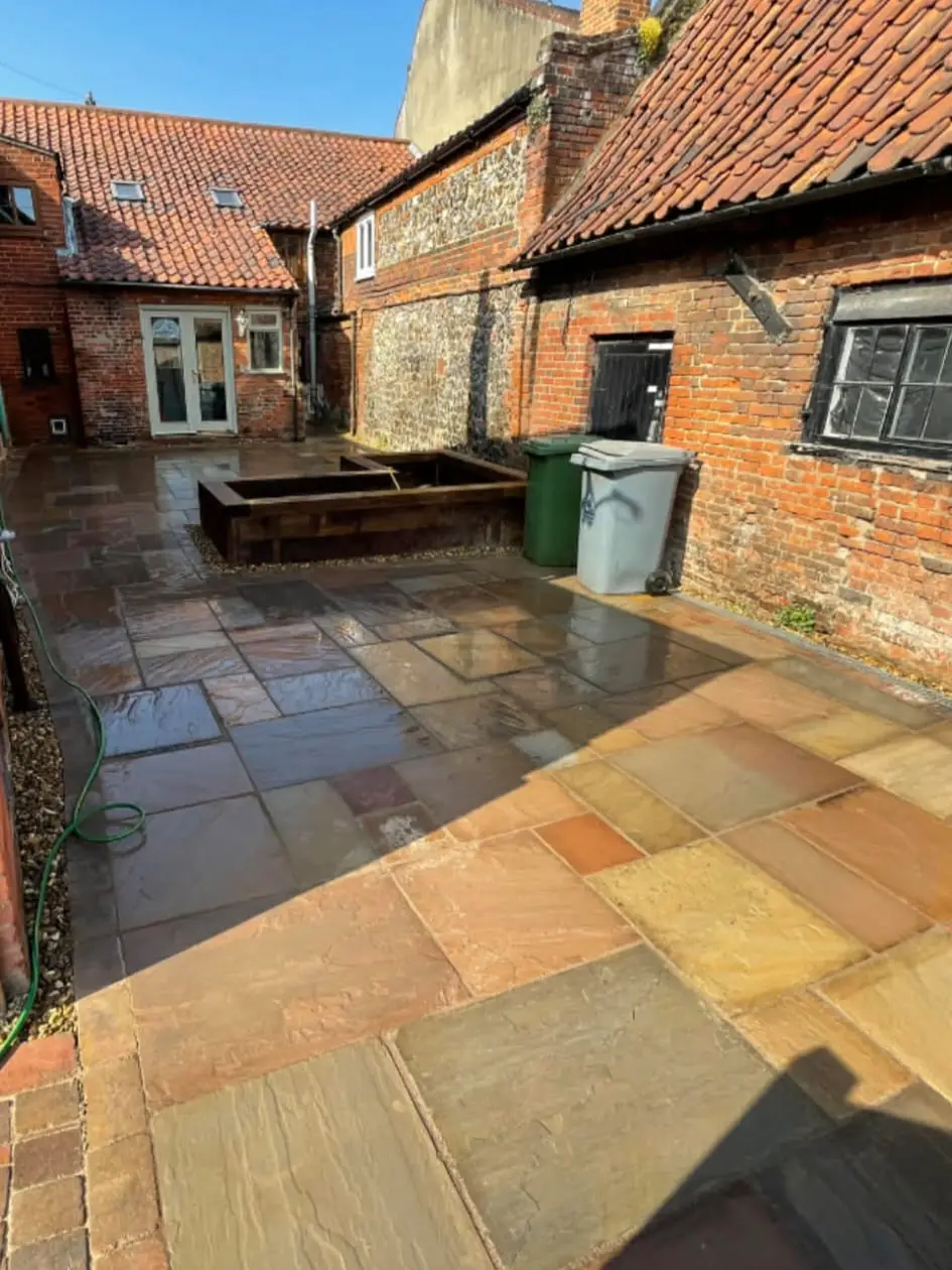 Patio styled as outdoor living room.