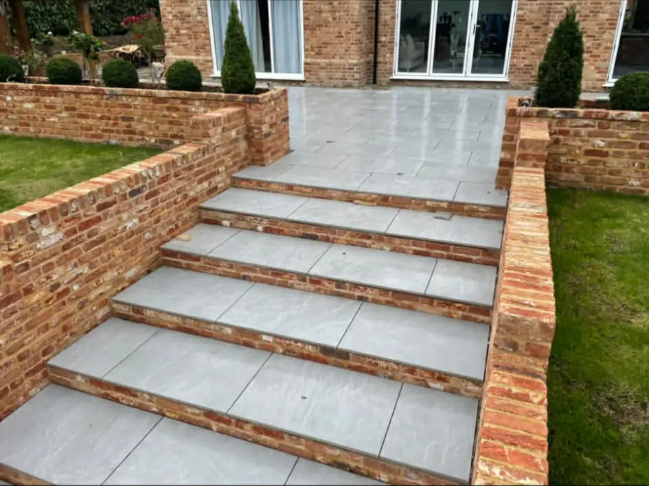 Family patio space with dining table and plants.